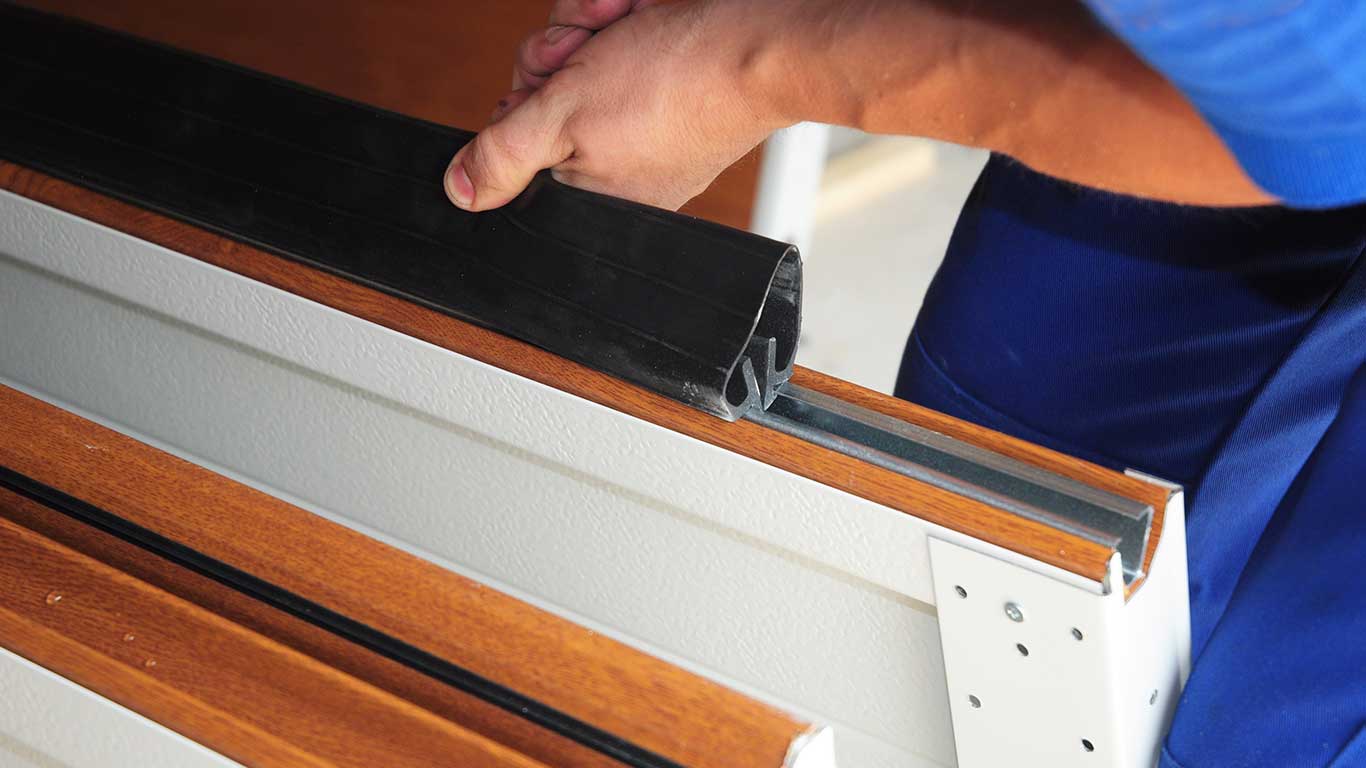 Adjusting garage door lining