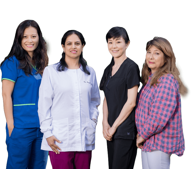 Dr. Taneja and the dental team
