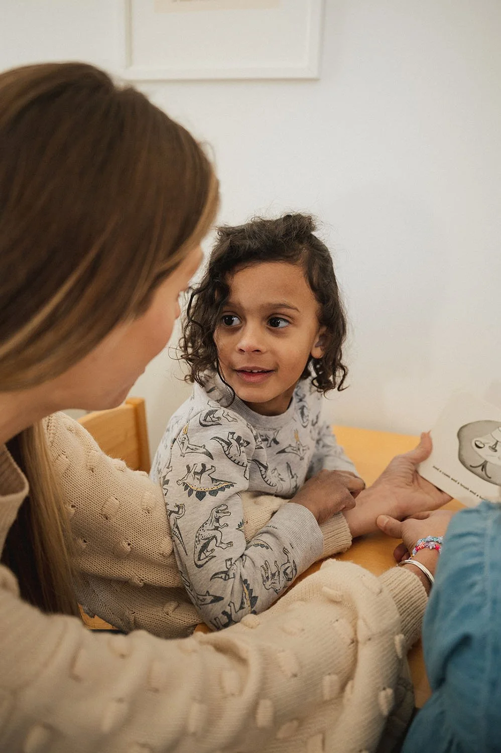 Therapist and little boy having a conversation