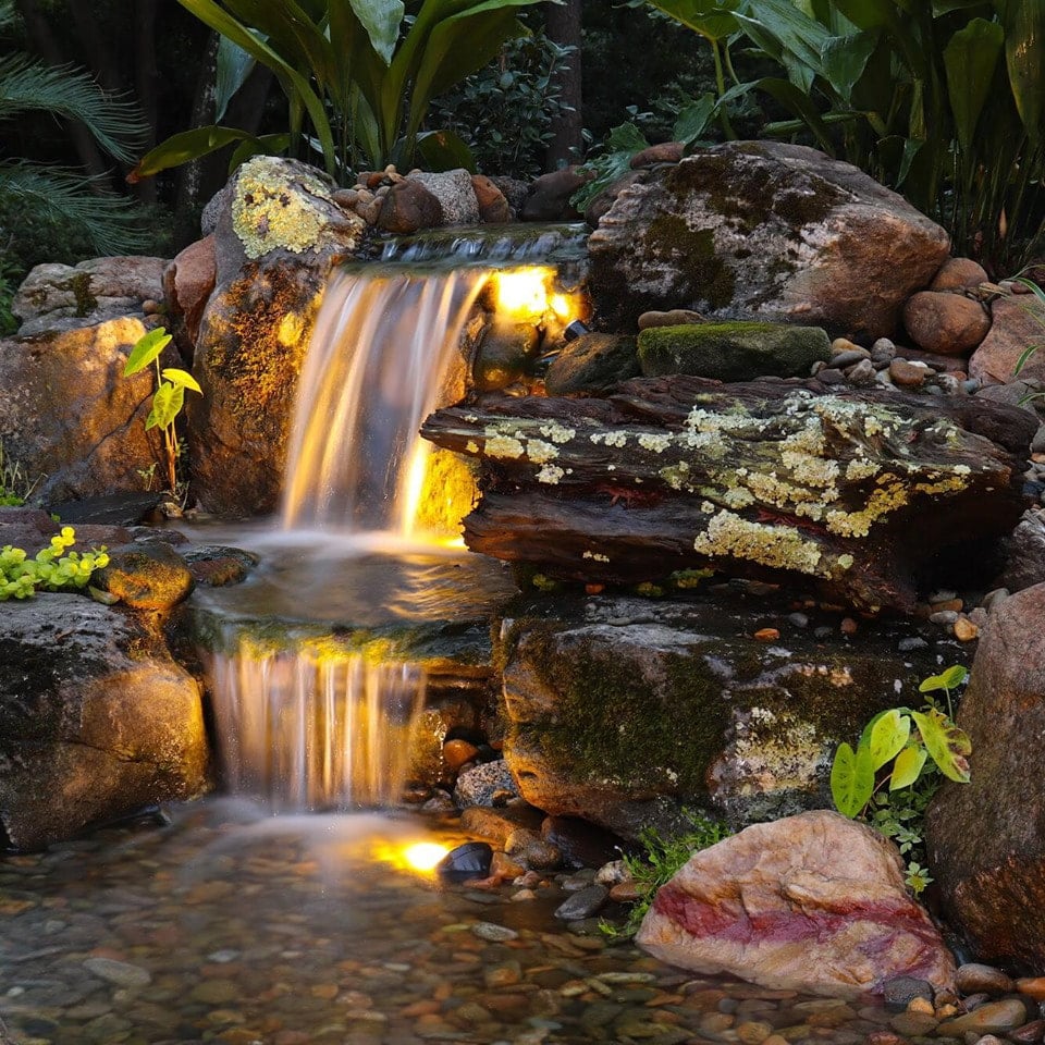 Waterfall with landscape lighting