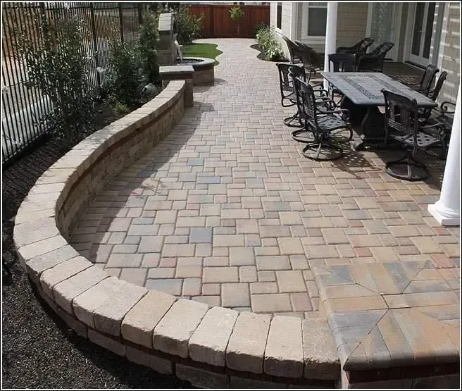 Beautiful patio with curved stone wall