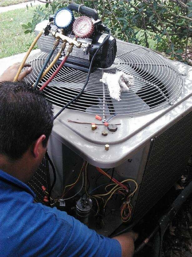 JPI Air HVAC technician at work