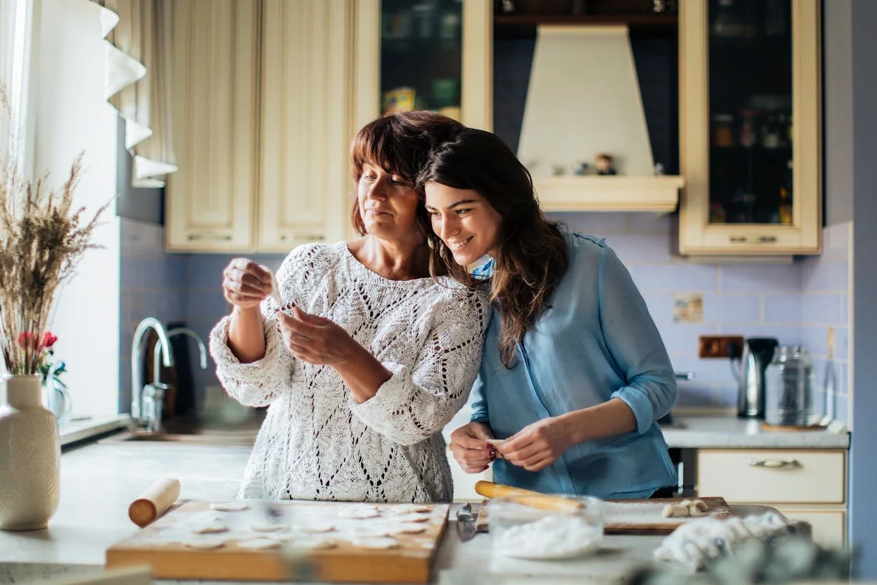 Two women baking together — family moments worth protecting