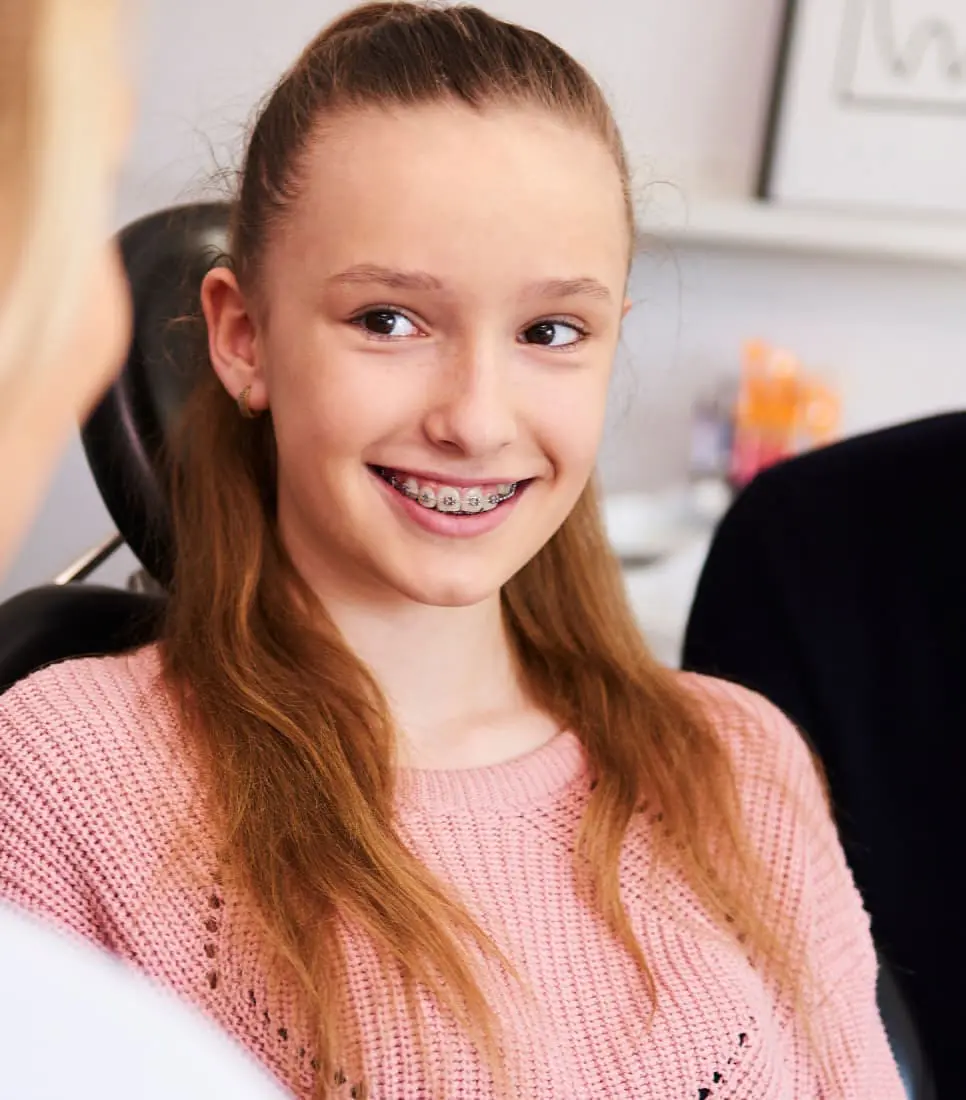 Child with braces at Limestone Hills Orthodontics Austin