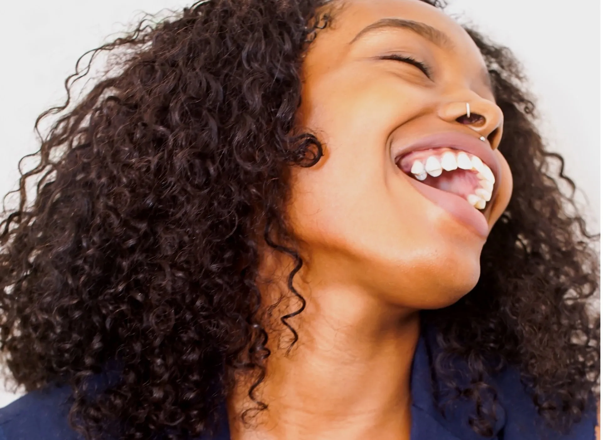 Beautiful woman with radiant skin at Mandel Dermatology