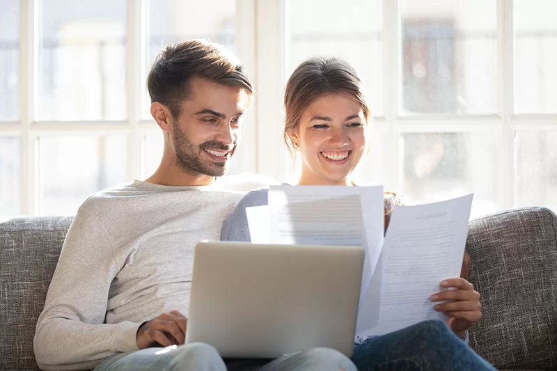 Couple reviewing loan documents