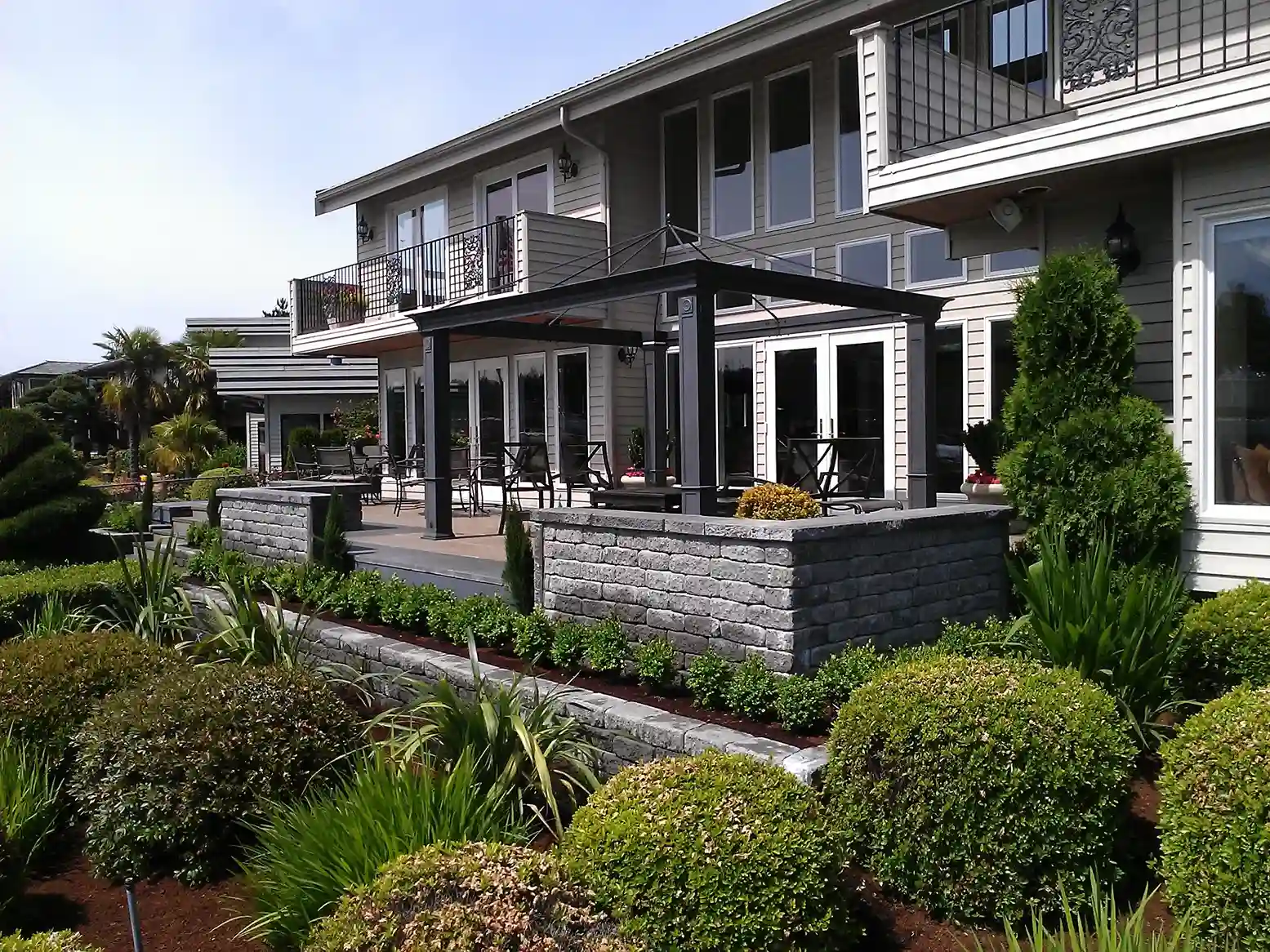 Landscaped backyard patio outdoor living space