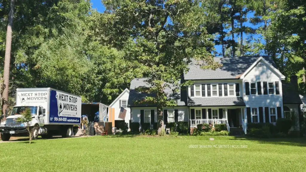 Next Stop Movers in front of a residential house
