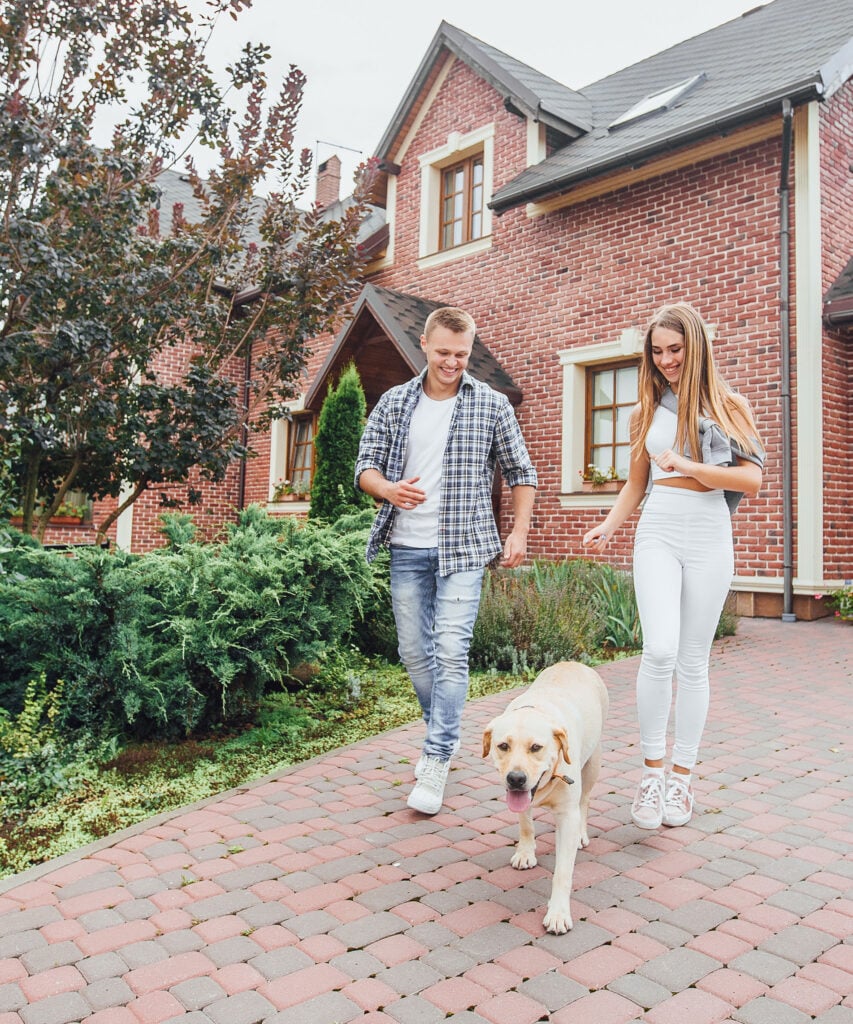 Happy homeowners with new exterior