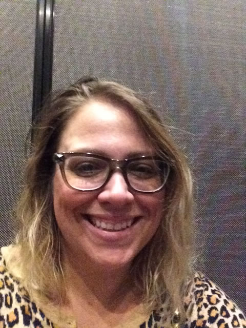 Kelly, feline specialist and photographer