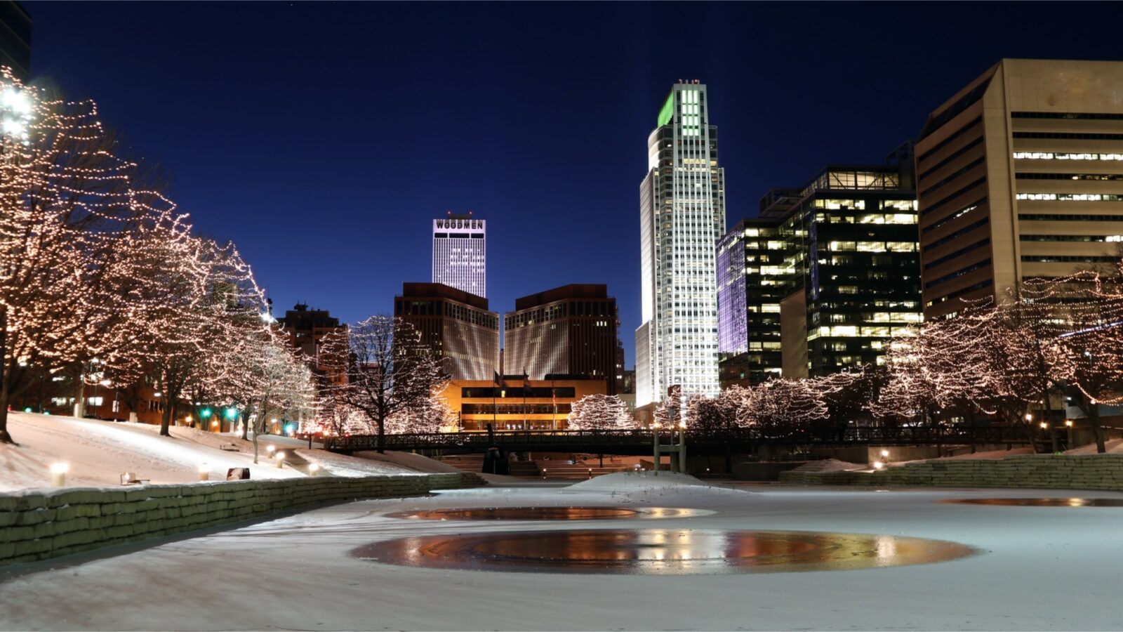 Night view of downtown Omaha skyline, our service area