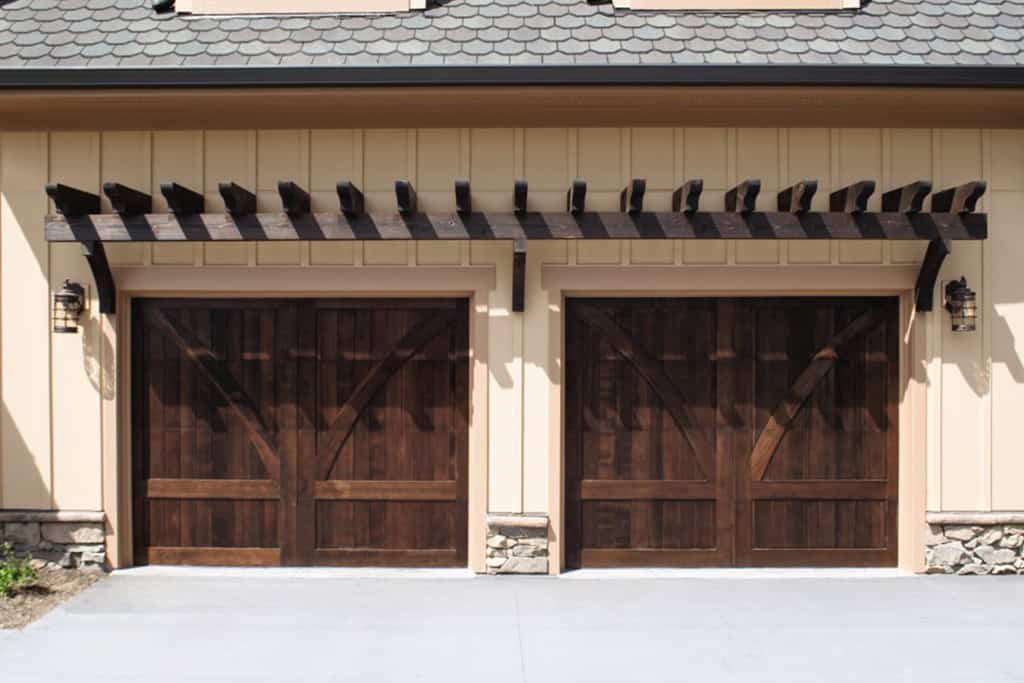 Signature carriage wood door