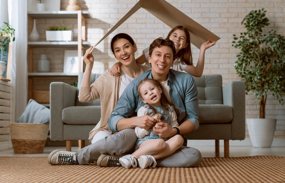 Happy family in their new home