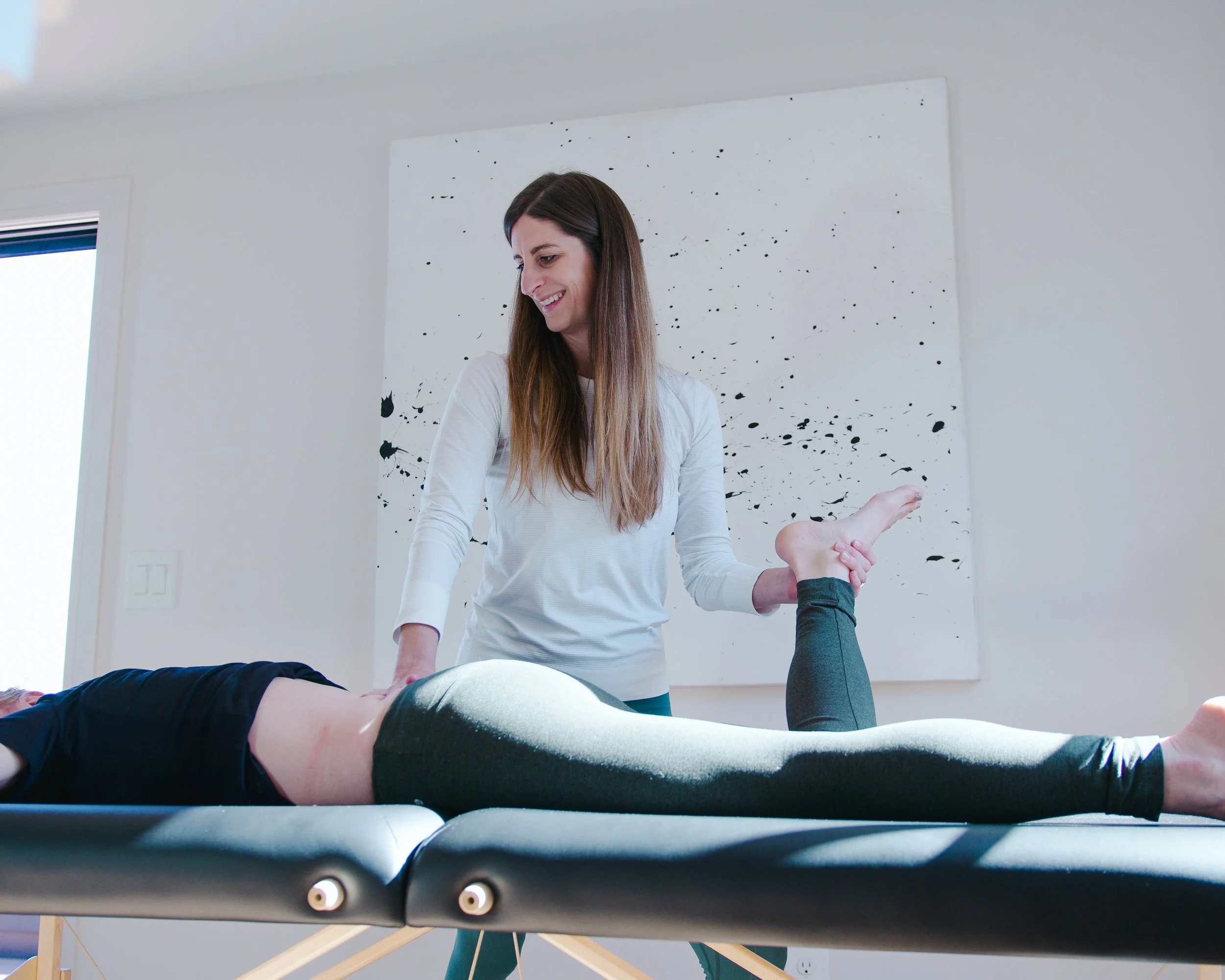 Ashley Hodges providing physical therapy