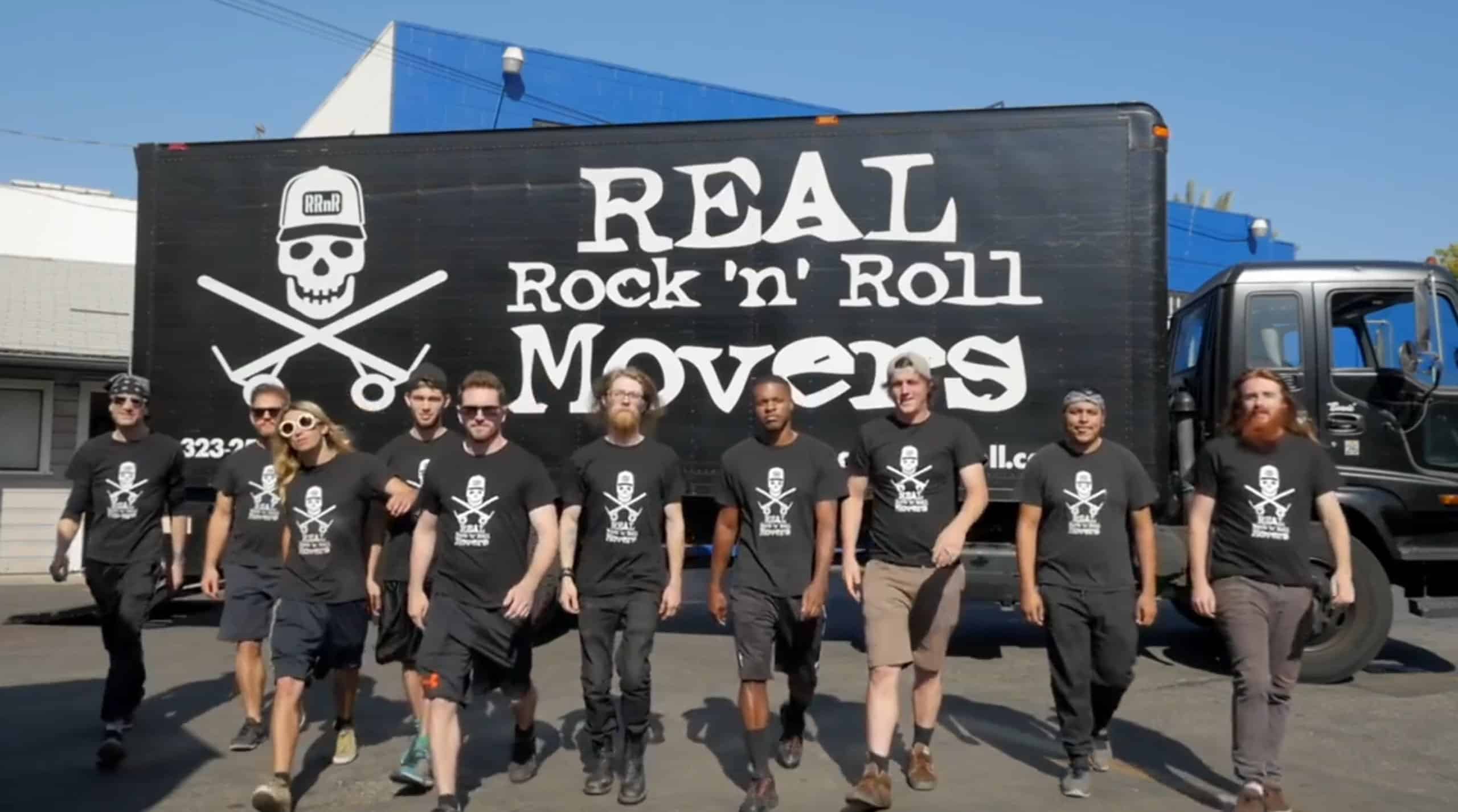REAL RocknRoll Movers crew in front of moving truck