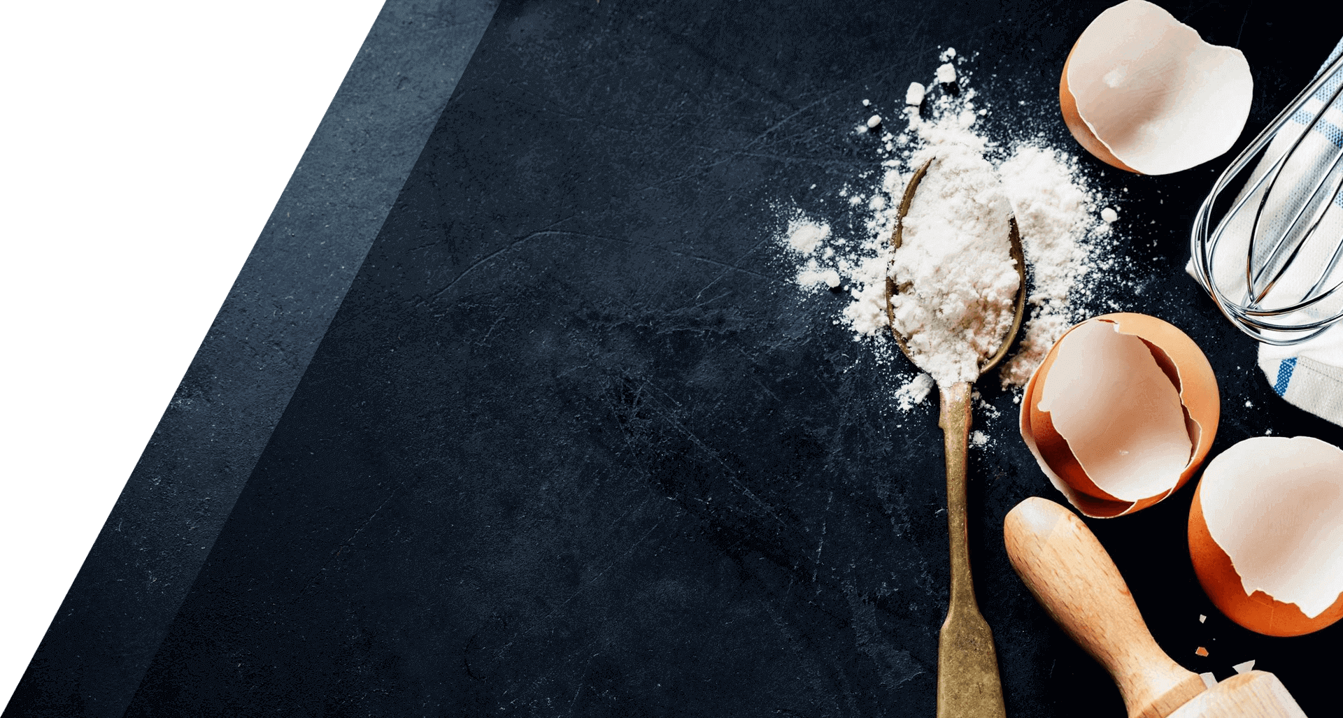 A person holding spoons with flour on them