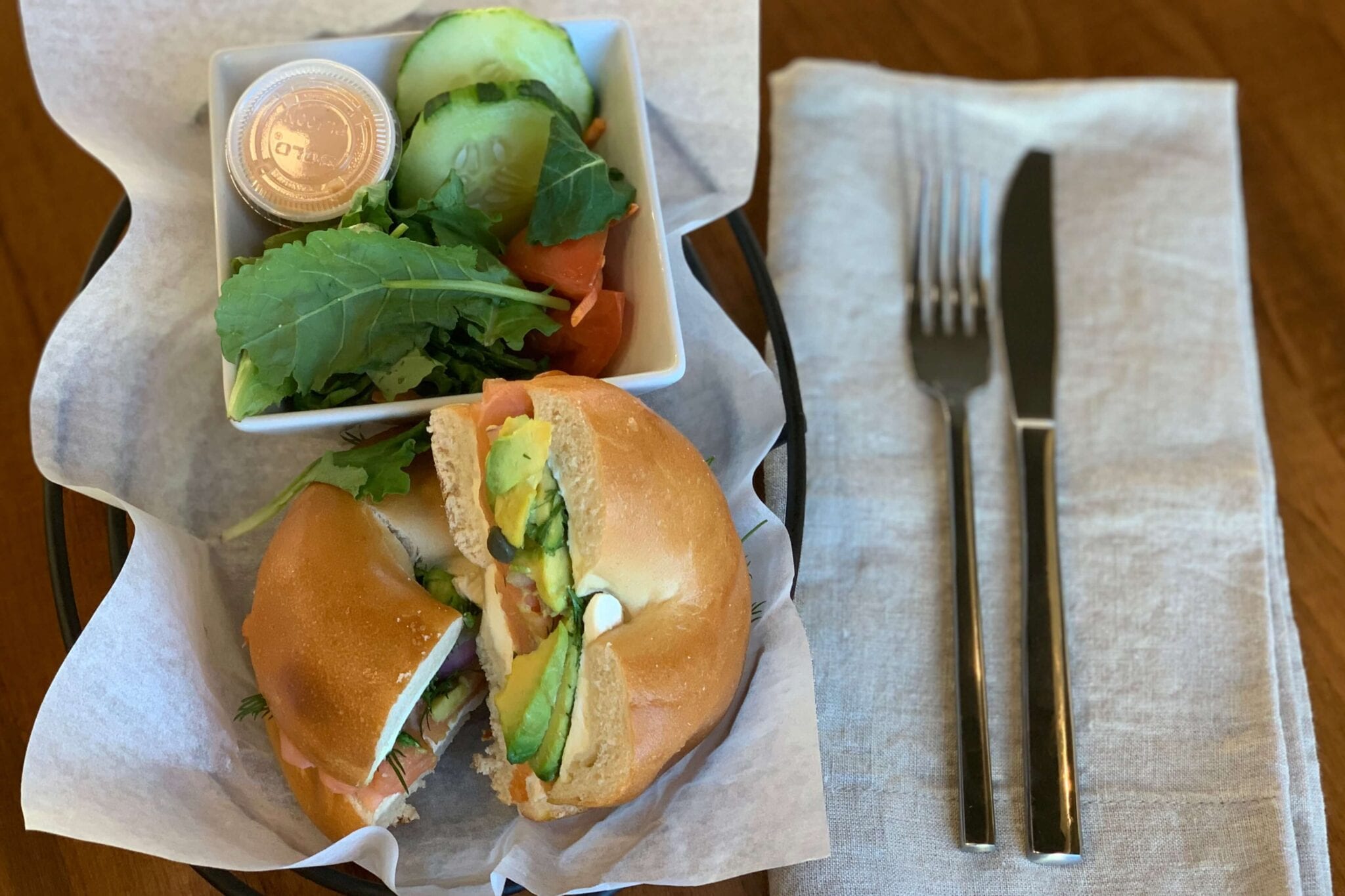 A sandwich and salad on the table