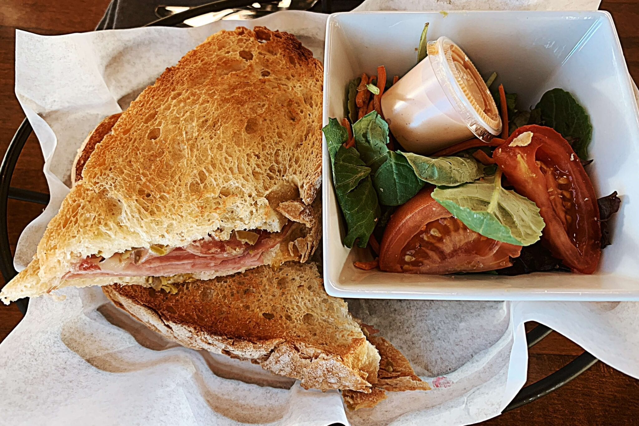 A sandwich and salad on the plate