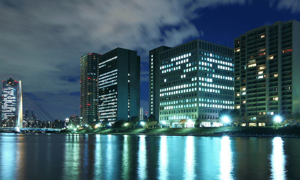 commercial building lit up at night