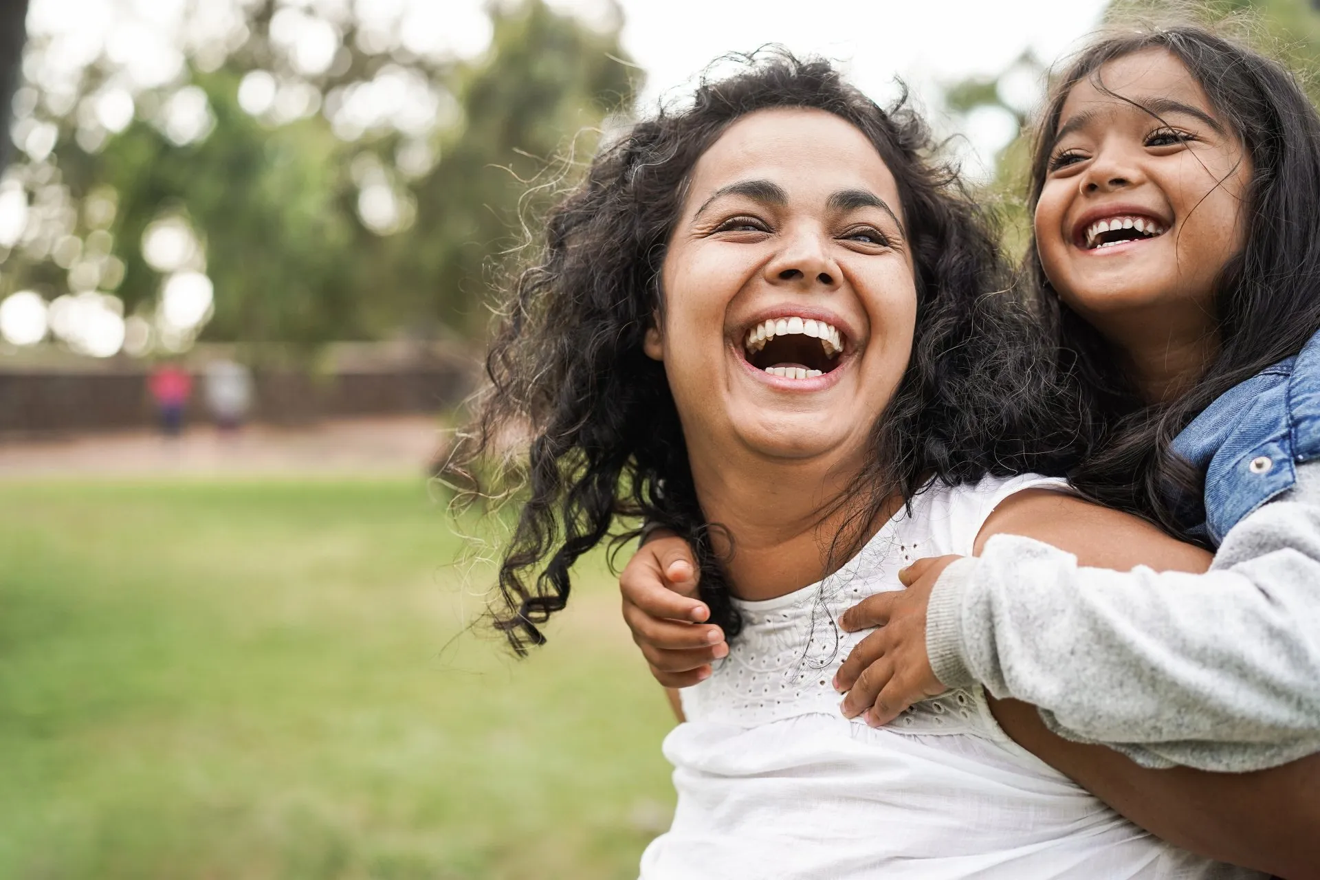 Mother and daughter laughing — Scott Nickels DDS Nashville