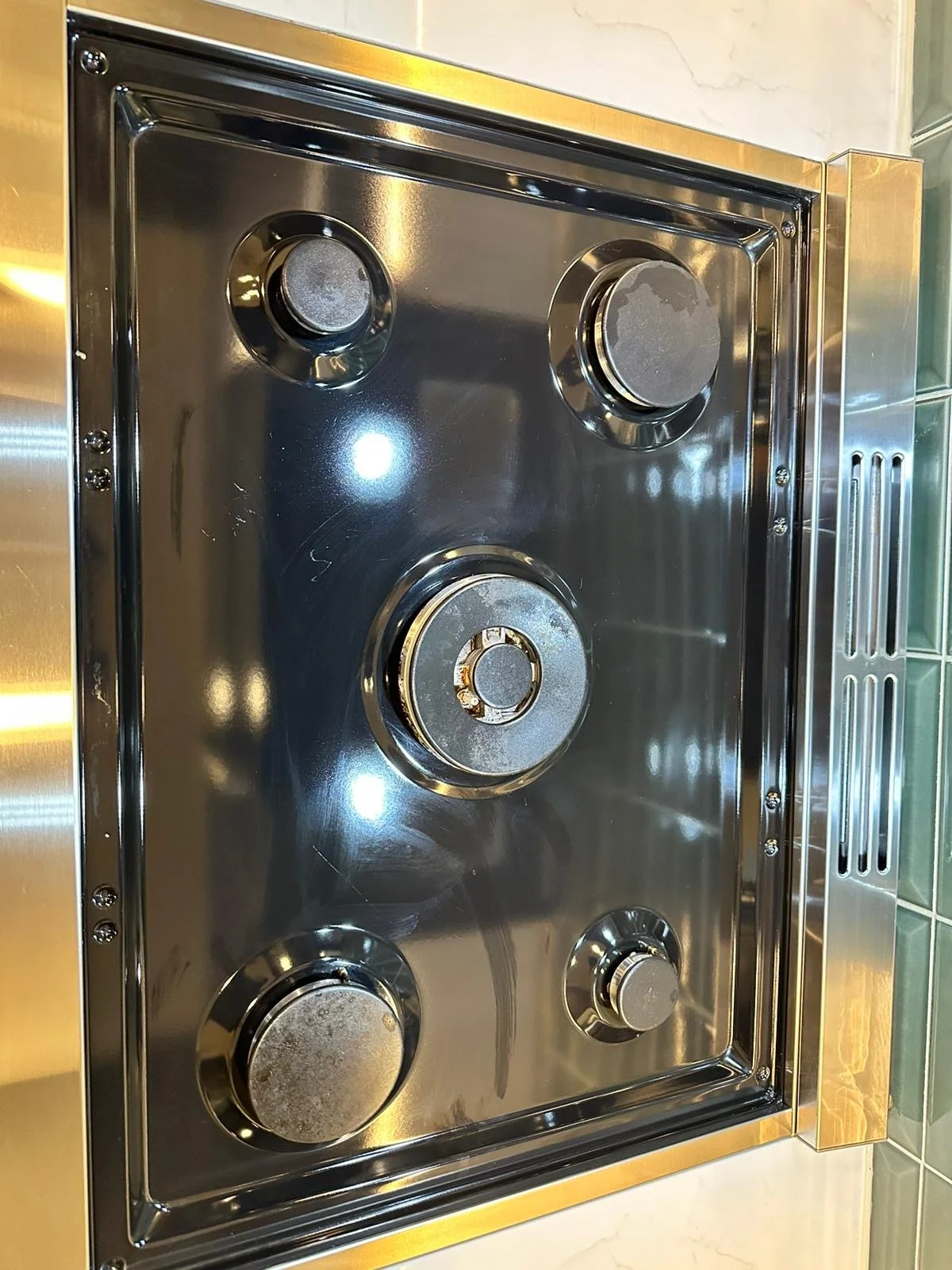 Clean stove burners after Sparkly Maid service