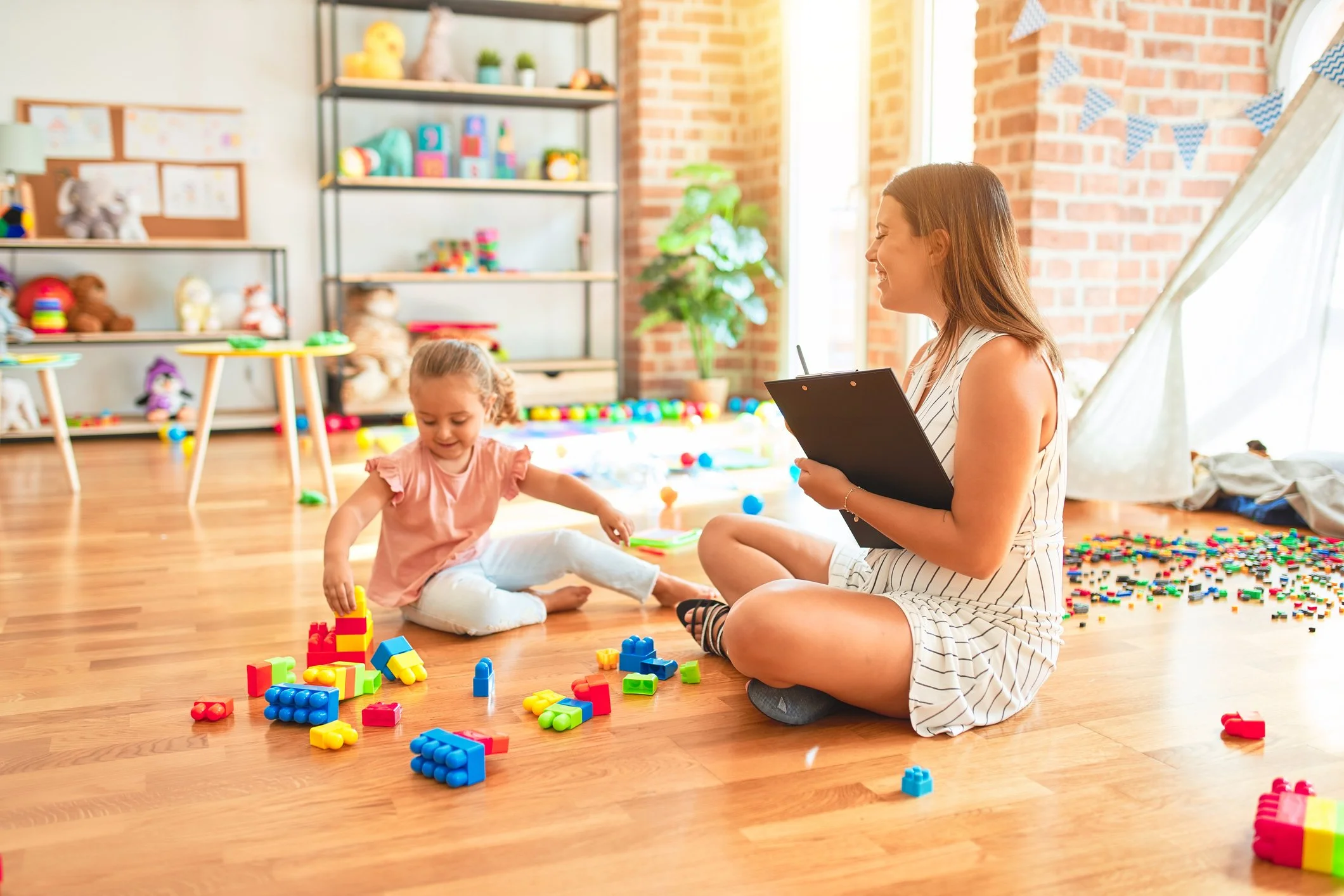 Speech therapist working with a young child