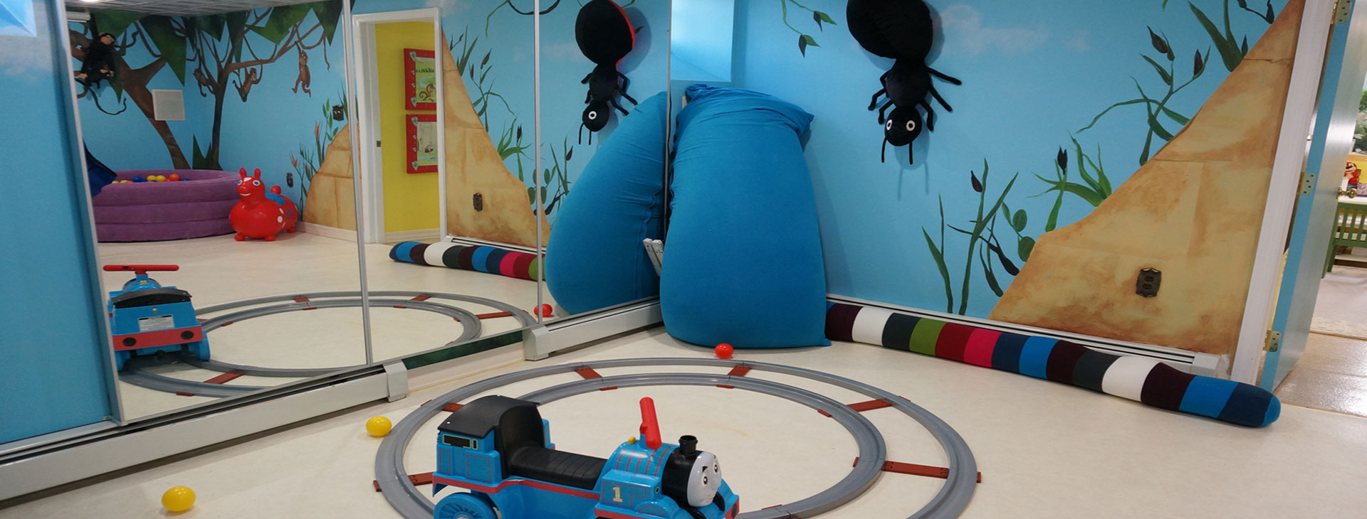 Christina Skuburdis working with a young child in speech therapy