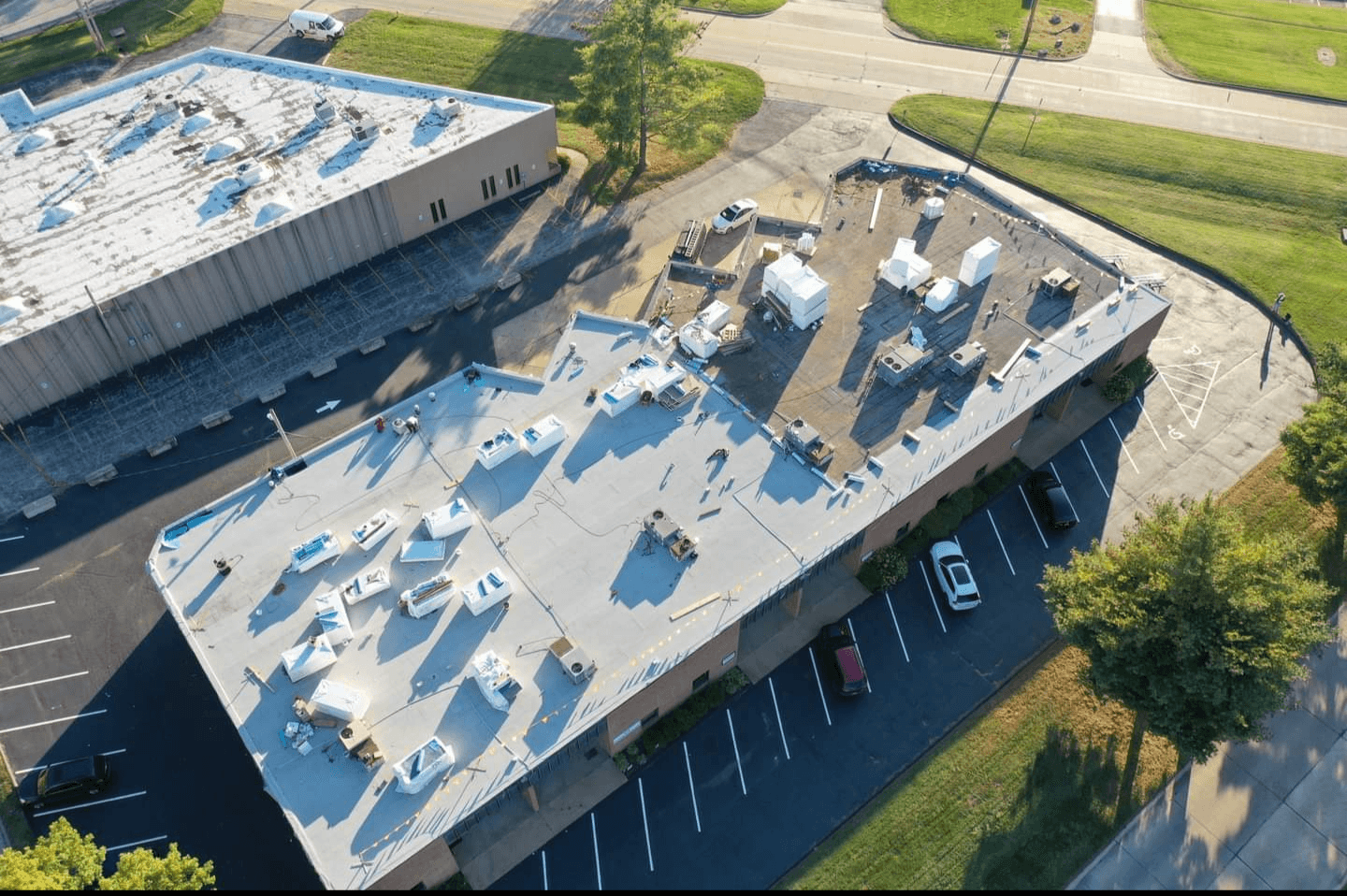 Tesson Roofing team and office