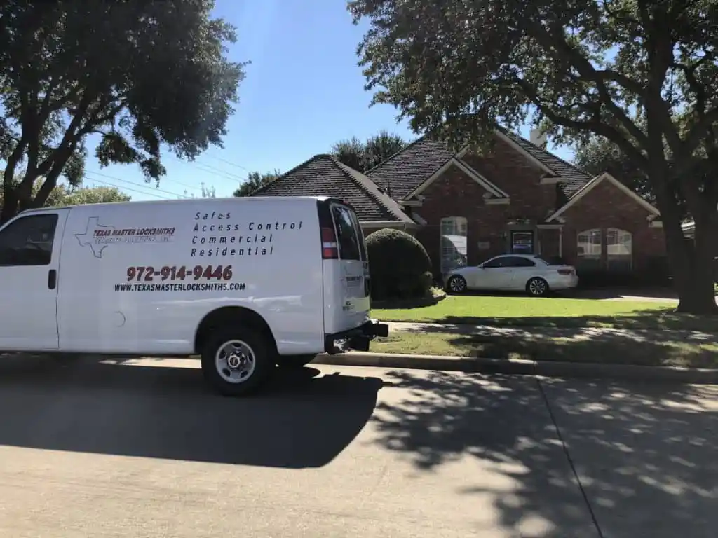 Texas Master Locksmiths van on job site