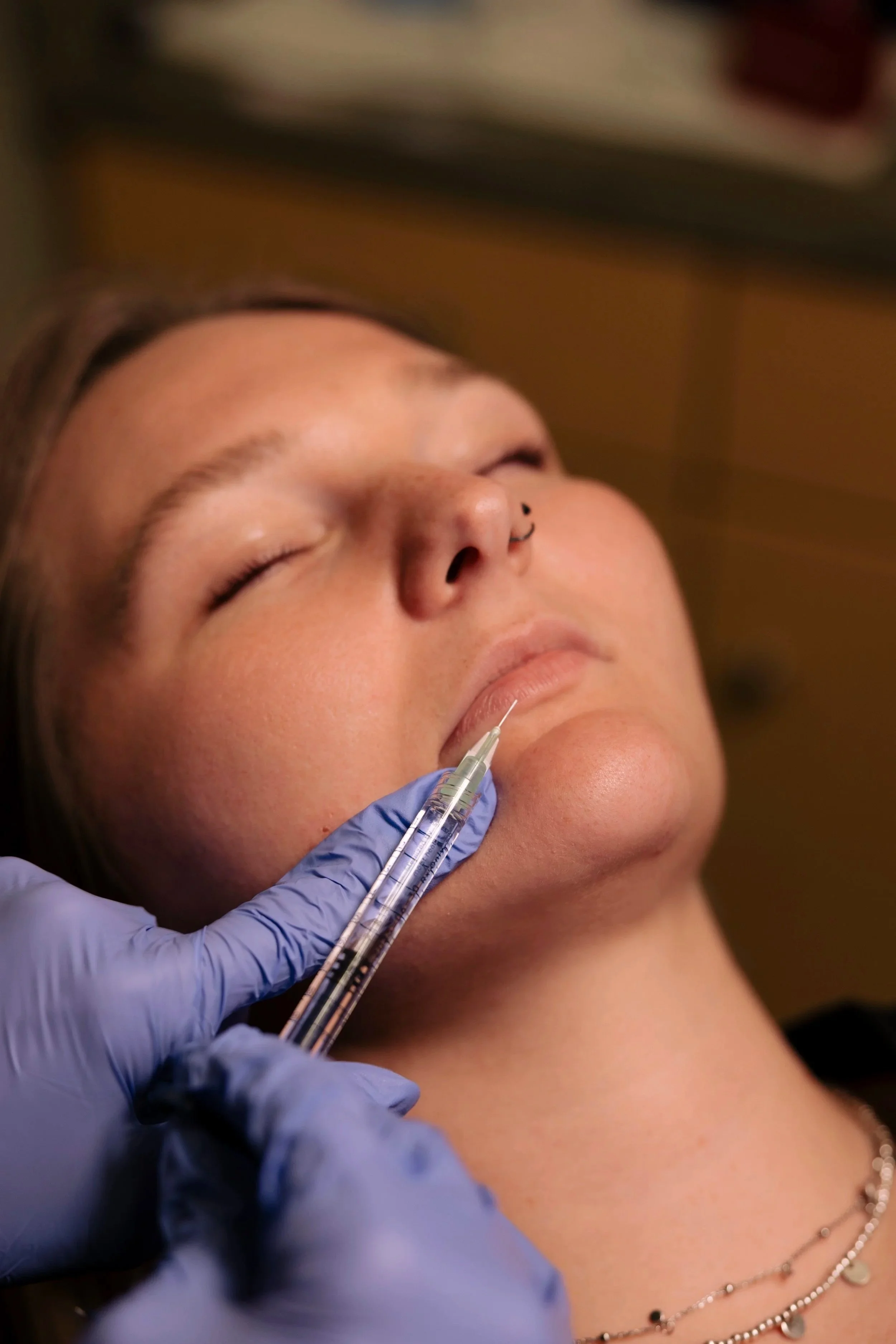 Dr. Emily McLaughlin - Double Board Certified Plastic Surgeon