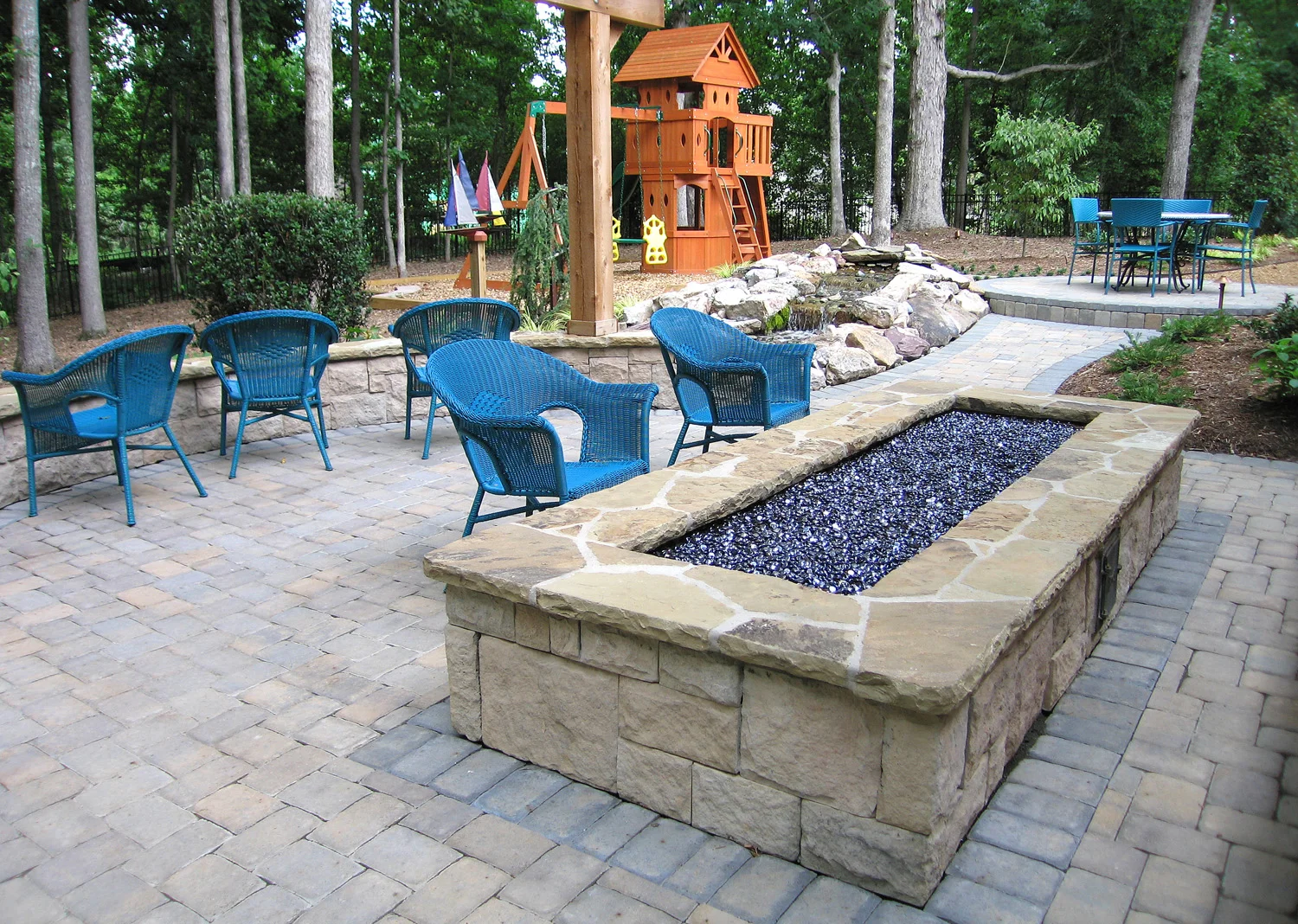 Ribbon fire feature and waterfall