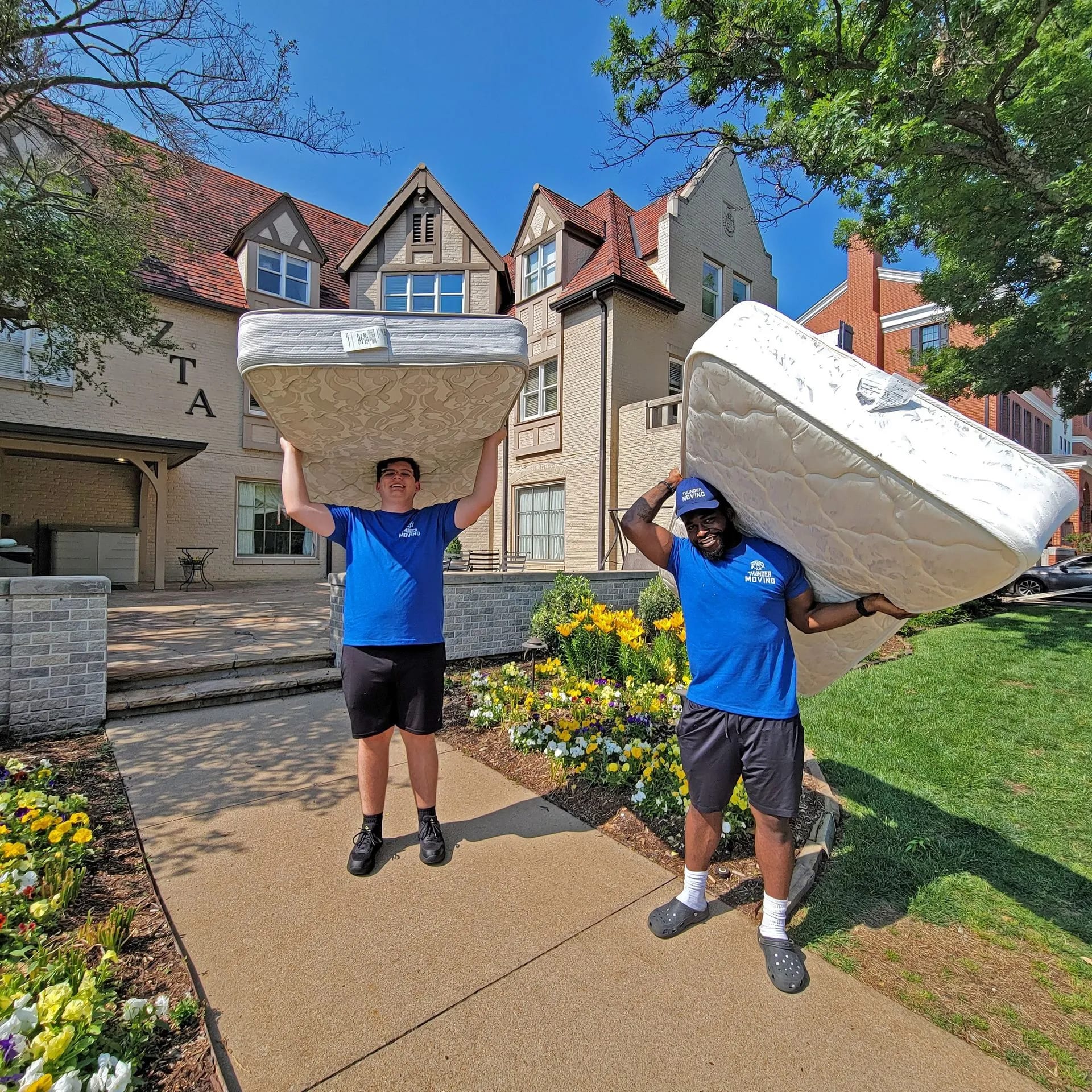Thunder Moving crew carrying mattress