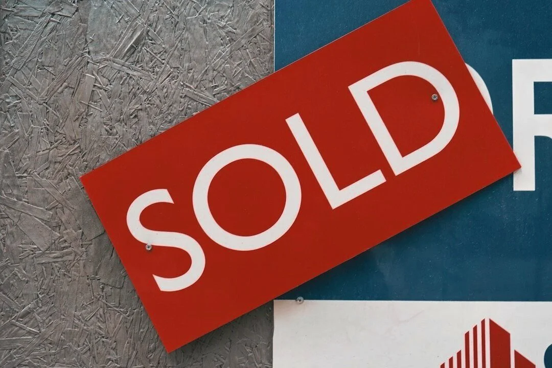 Real estate sold sign