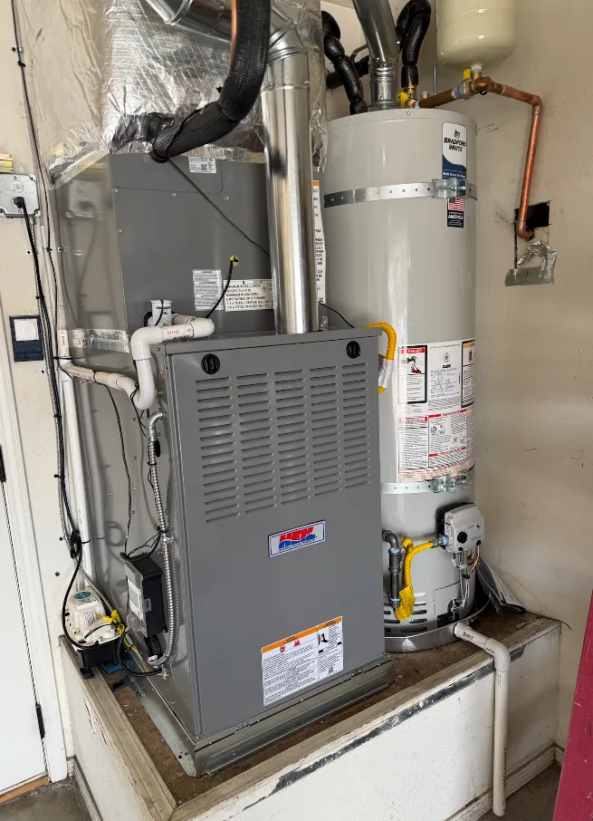 A person giving thumbs up in front of an air conditioner